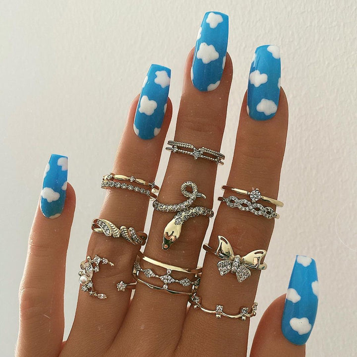 Exquisite artificial nails with cloud design and shine Bowlift