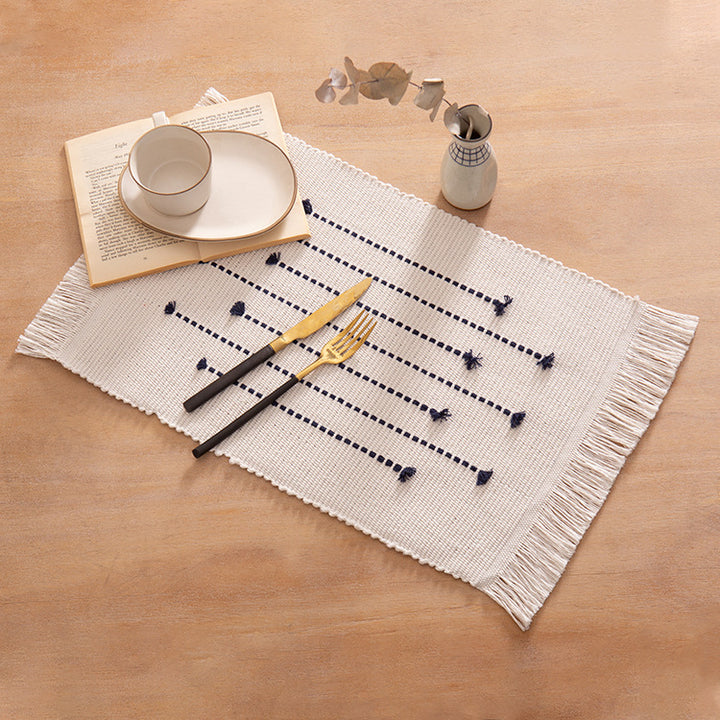Rectangular woven placemats in fine striped textured design made of cotton blend