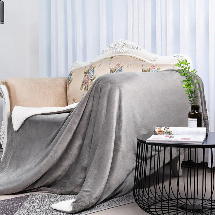 Women's reversible blanket in modern design with soft plush Bowlift