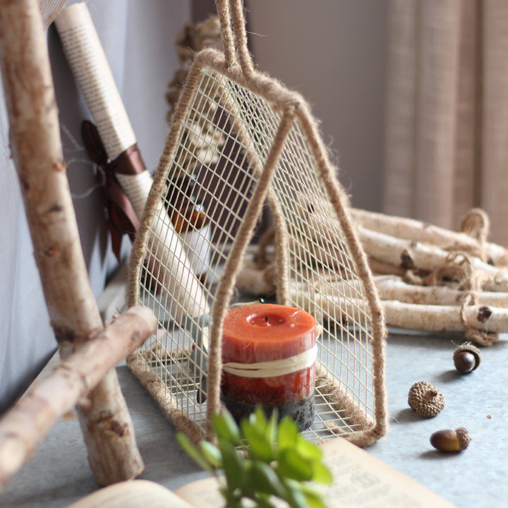 Decorative plant holder made of wire and natural fiber Bowlift