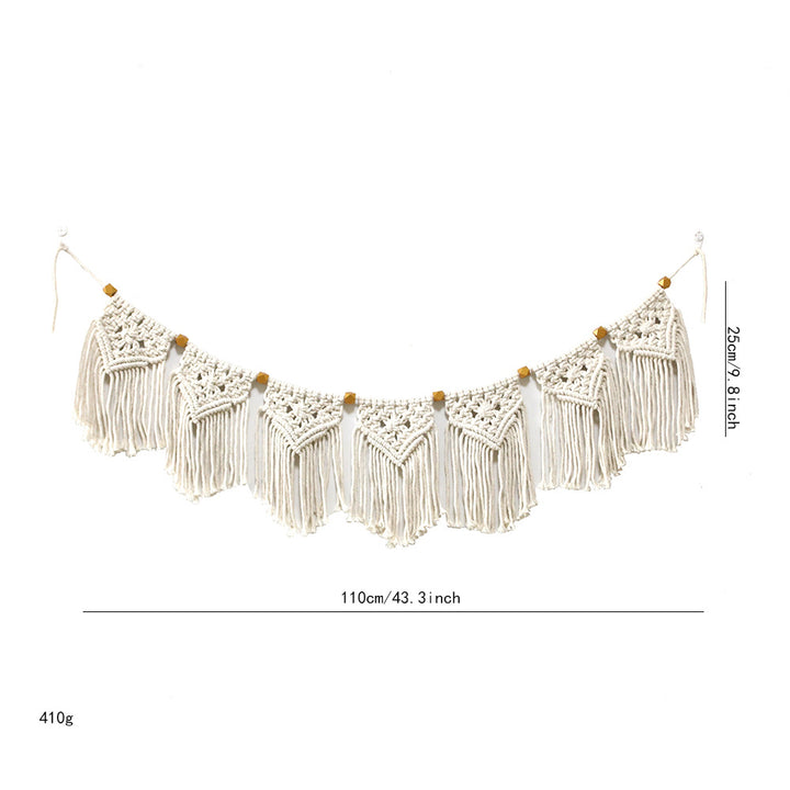 Decorative macrame wall hanging with ornate fringes