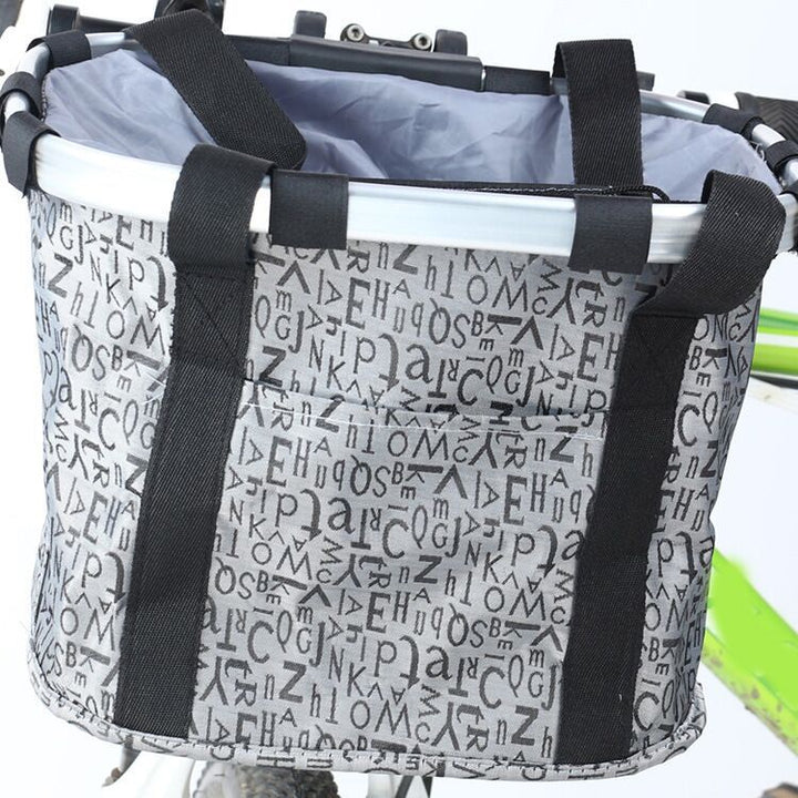 collapsible insulated front bike basket with quick-release mounting and waterproof liner Bowlift