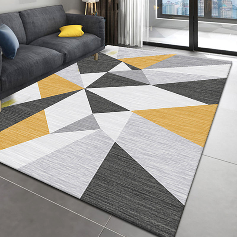 Casual living room rug Multi-colored geo print indoor rug Non-slip underside Washable easy-care rug | Bowlift