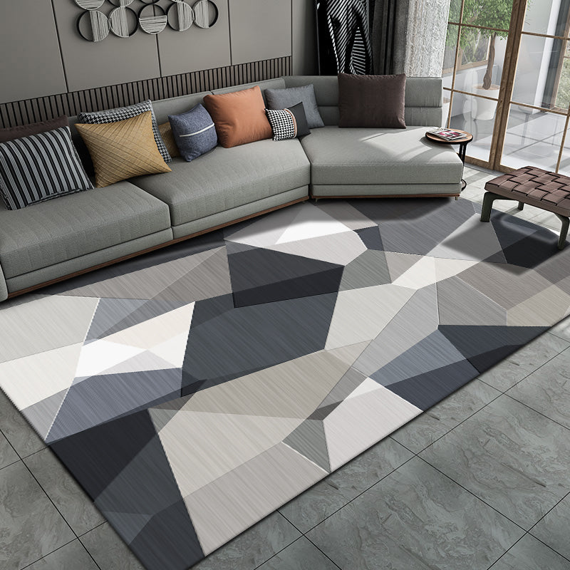Casual living room rug Multi-colored geo print indoor rug Non-slip underside Washable easy-care rug | Bowlift