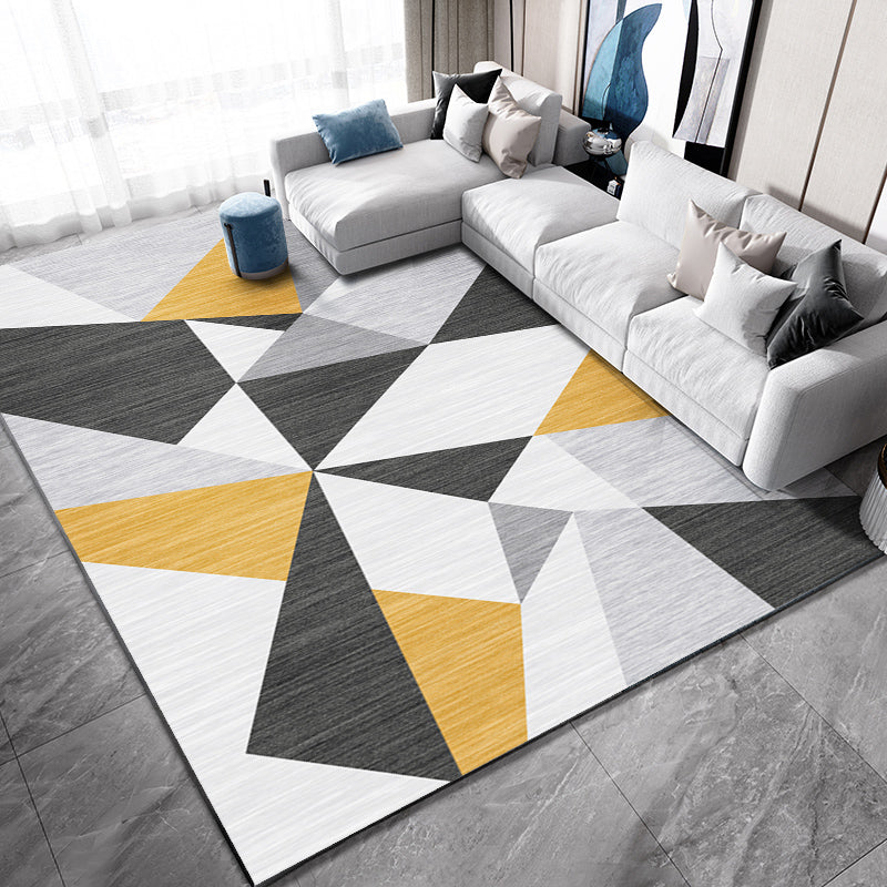 Casual living room rug Multi-colored geo print indoor rug Non-slip underside Washable easy-care rug | Bowlift