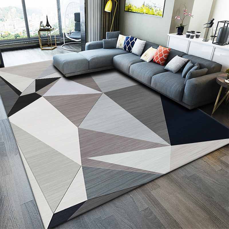 Casual living room rug Multi-colored geo print indoor rug Non-slip underside Washable easy-care rug | Bowlift