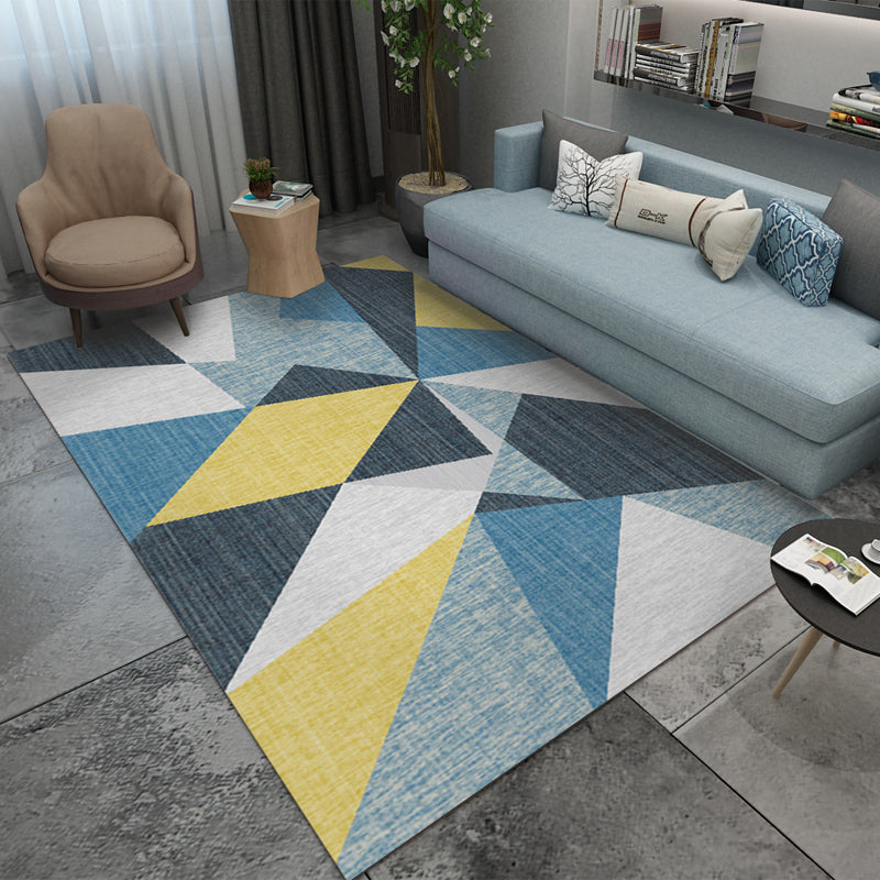 Casual living room rug Multi-colored geo print indoor rug Non-slip underside Washable easy-care rug | Bowlift
