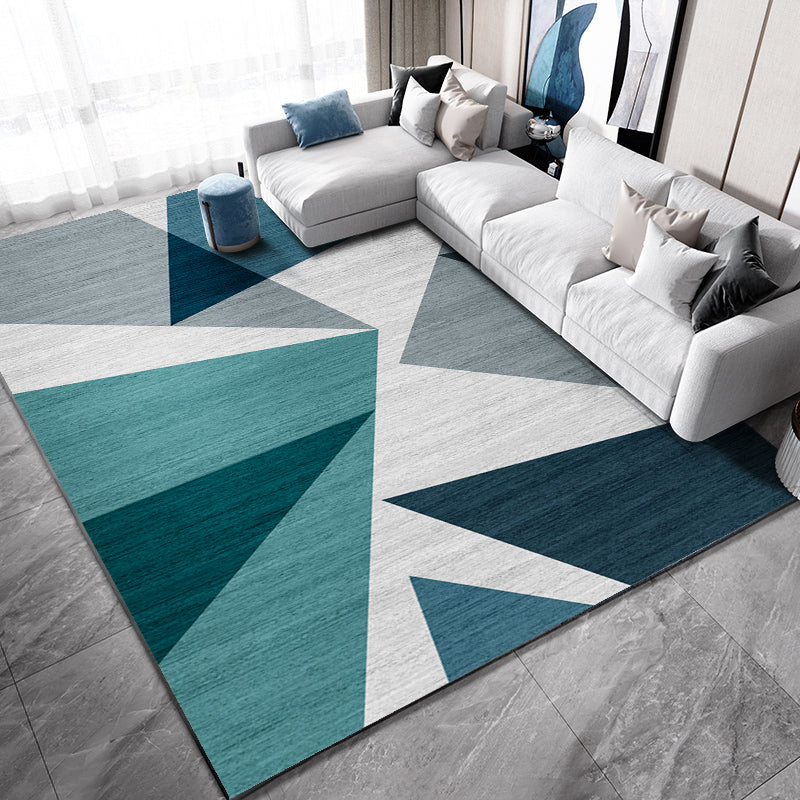 Casual living room rug Multi-colored geo print indoor rug Non-slip underside Washable easy-care rug | Bowlift