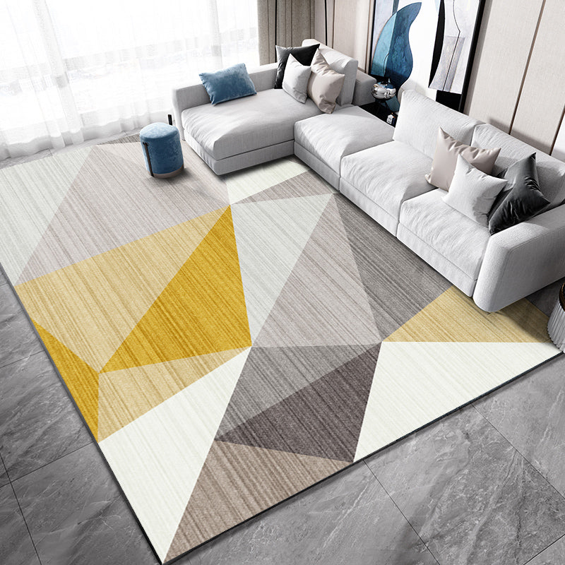 Casual living room rug Multi-colored geo print indoor rug Non-slip underside Washable easy-care rug | Bowlift