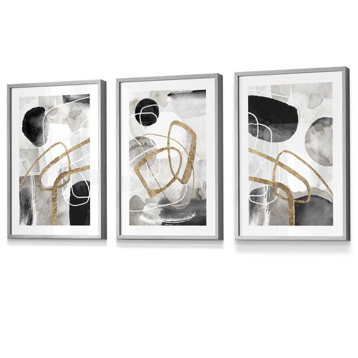 Abstract black, gray, and gold shapes set of 3 framed wall art prints | Bowlift