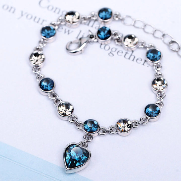 Enchanting Ocean Heart Crystal Bracelet with Radiant Blue Heart Charm Bowlift