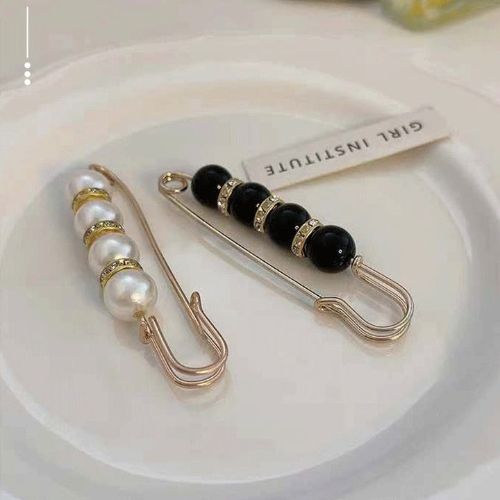 BowLift | Brooch made of pearls and alloy