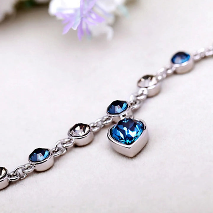 Enchanting Ocean Heart Crystal Bracelet with Radiant Blue Heart Charm Bowlift