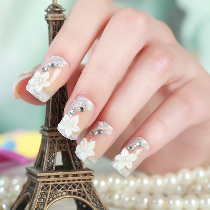 Artificial nails with delicate floral decorations Bowlift