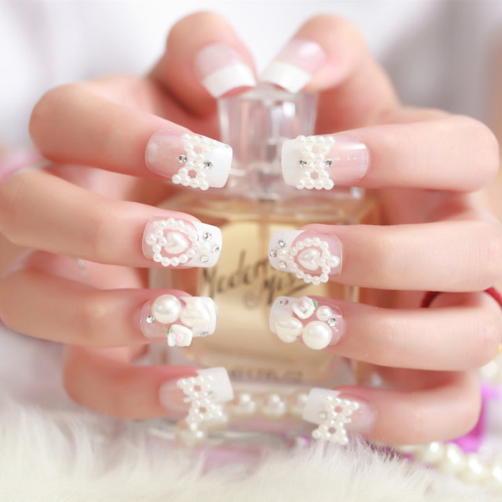 Artificial nails with delicate floral decorations Bowlift