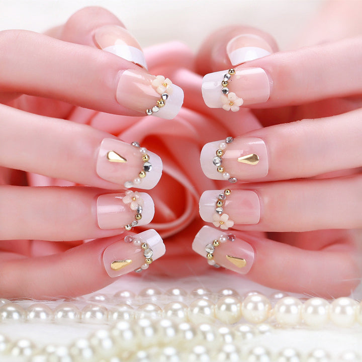 Artificial nails with delicate floral decorations Bowlift