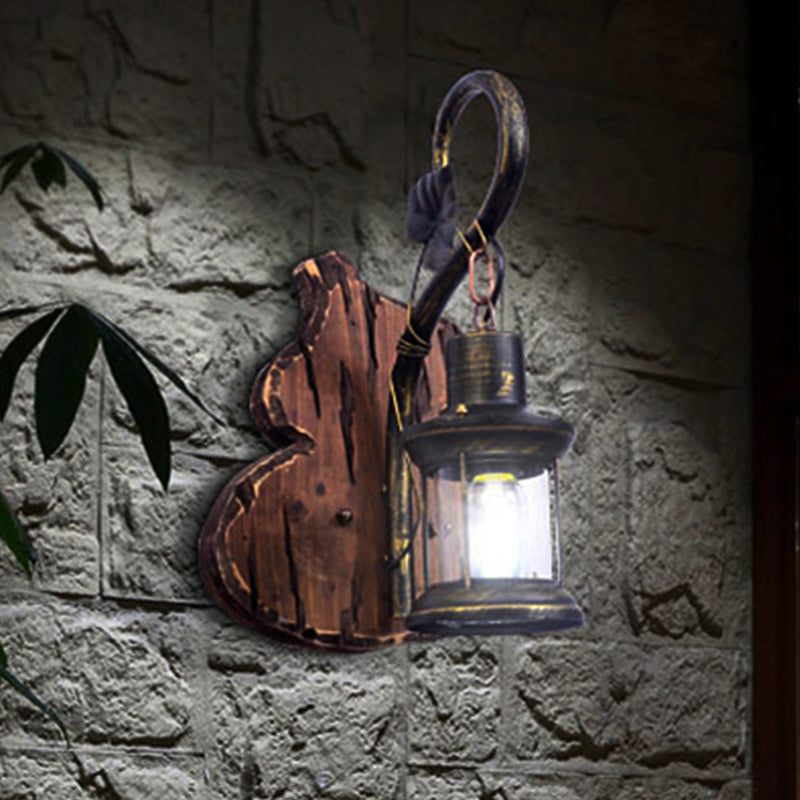 BowLift | Coastal Lantern Wall Lighting Fixture 1 Lamp Clear Glass Wall Light in Antique Brass with Gourd Back Plate