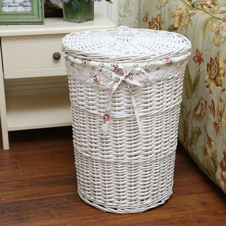 Women's laundry basket made of woven natural material with decorative fabric lining Bowlift