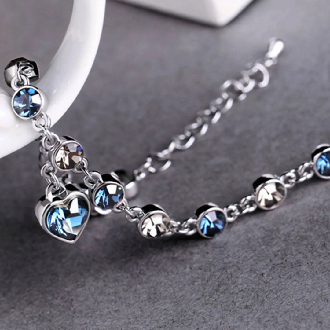 Enchanting Ocean Heart Crystal Bracelet with Radiant Blue Heart Charm Bowlift