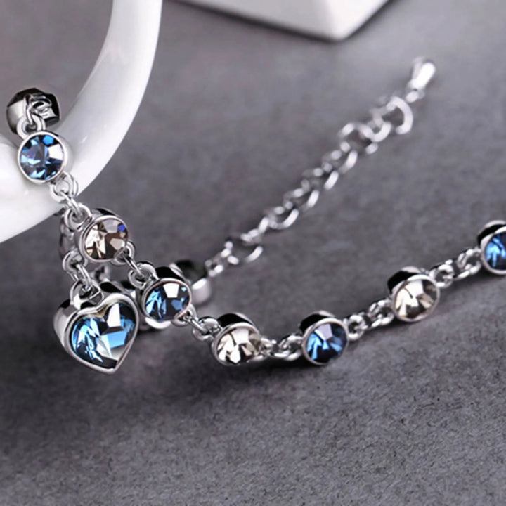 Enchanting Ocean Heart Crystal Bracelet with Radiant Blue Heart Charm Bowlift