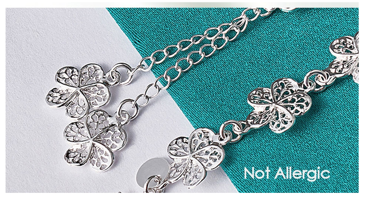 Elegant Silver Filigree Bracelet with Unique Links Bowlift