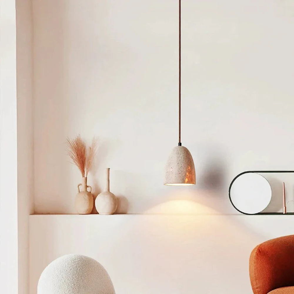 BowLift | TerraLume – Pendant light with natural stone texture and warm glow