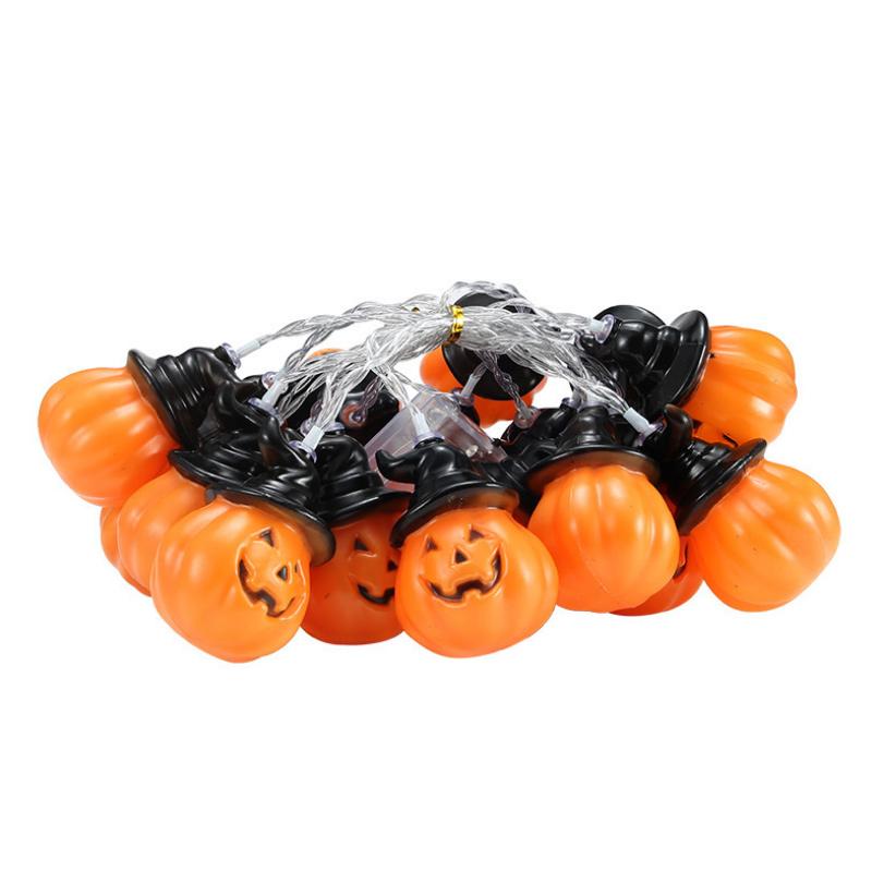 Glowing pumpkin garland Halloween with witch hats | Bowlift