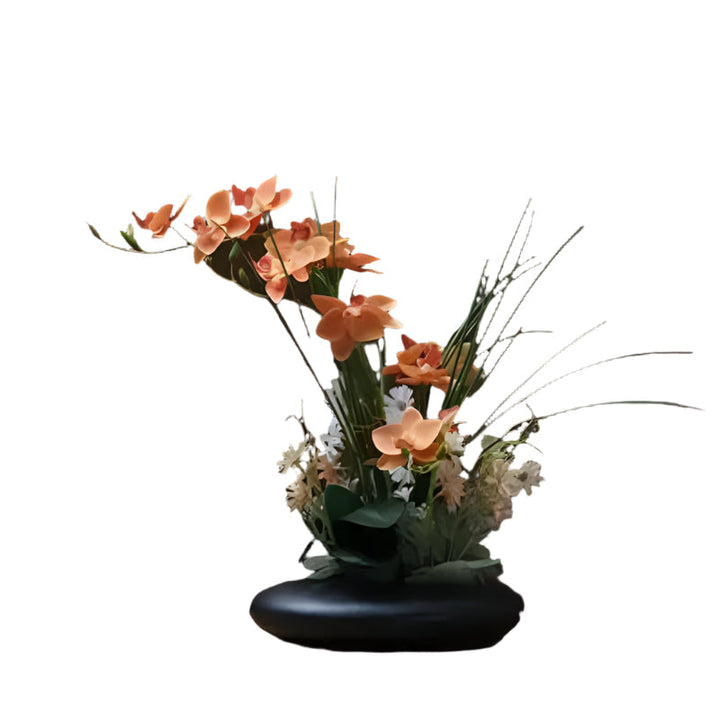 Lifelike flower arrangement in a modern vase Bowlift