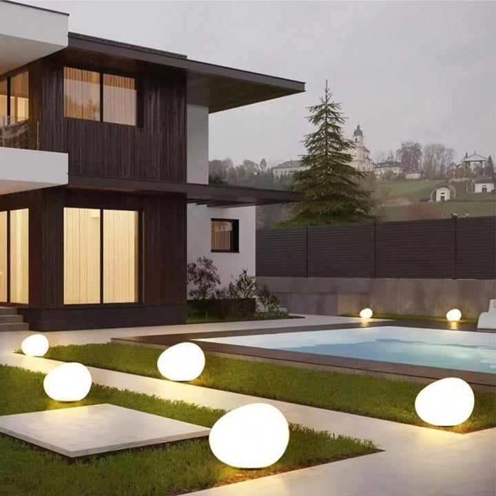 LuminaStone — Enchants your garden with warm, wireless light for magical evenings | Bowlift