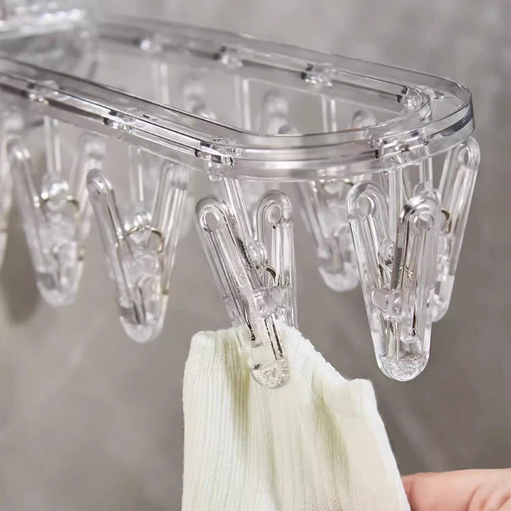 BowLift | Suction cup collapsible clothes hanger with clip
