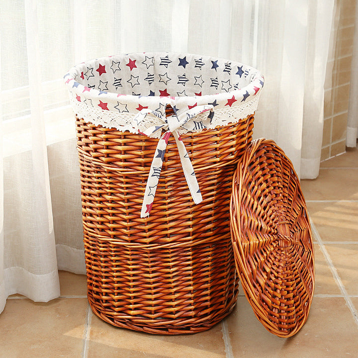 Women's laundry basket made of woven natural material with decorative fabric lining Bowlift