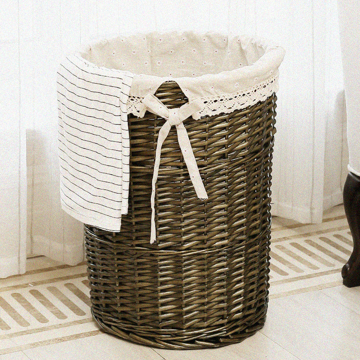 Women's laundry basket made of woven natural material with decorative fabric lining Bowlift