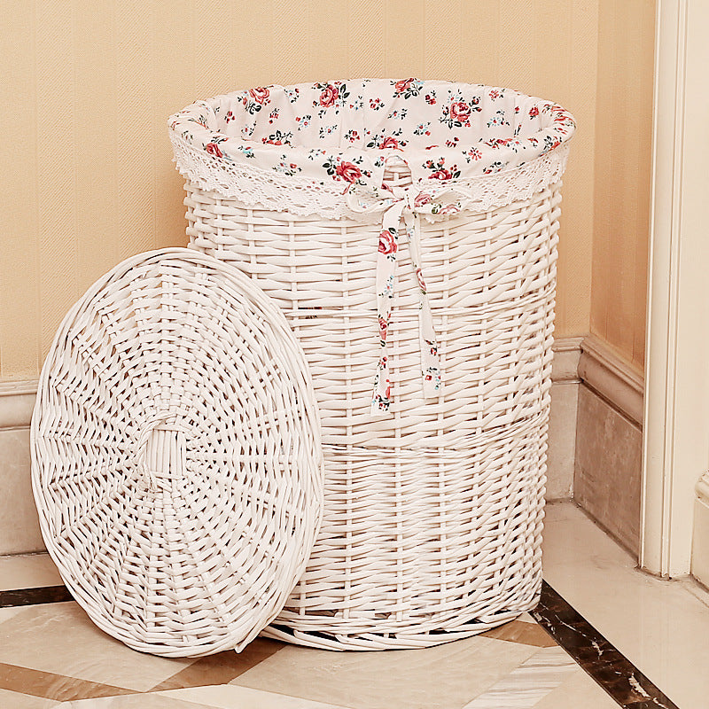 Women's laundry basket made of woven natural material with decorative fabric lining Bowlift