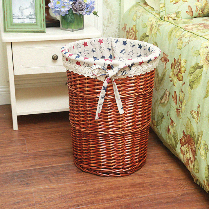 Women's laundry basket with decorative fabric lining and practical carrying handle Bowlift