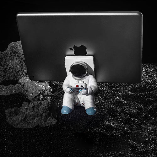 Support for phones or pens in astronaut decorations | Bowlift