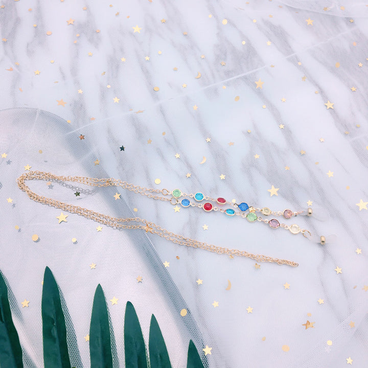 Filigree jewelry necklace with colorful crystals Bowlift
