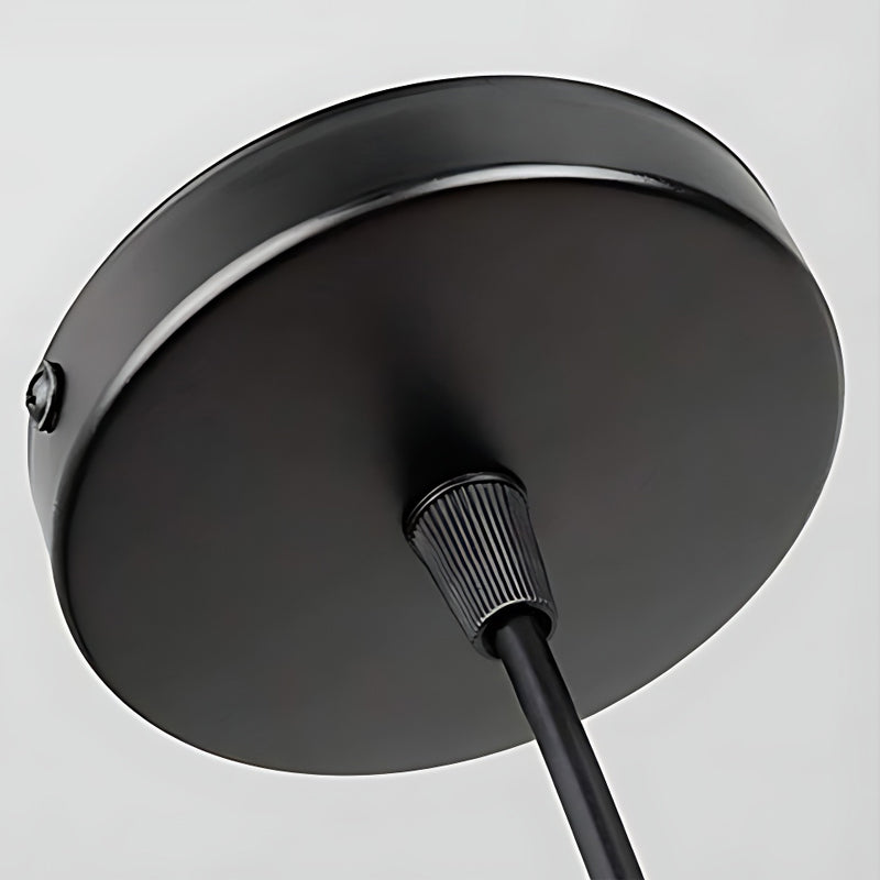 BowLift | IronSphere Pendant - Black industrial iron pendant light for modern interiors