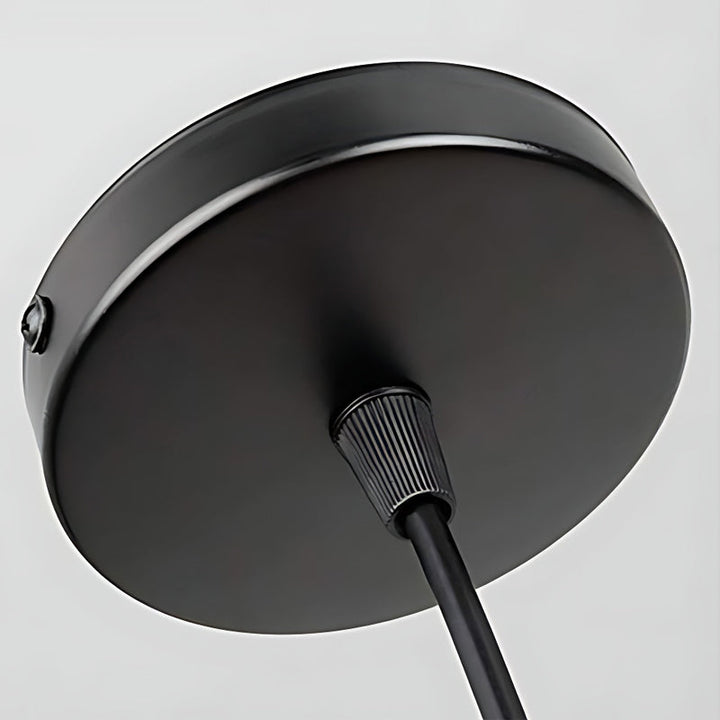 BowLift | IronSphere Pendant - Black industrial iron pendant light for modern interiors