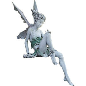 BowLift | Statue of sitting fairy in the garden