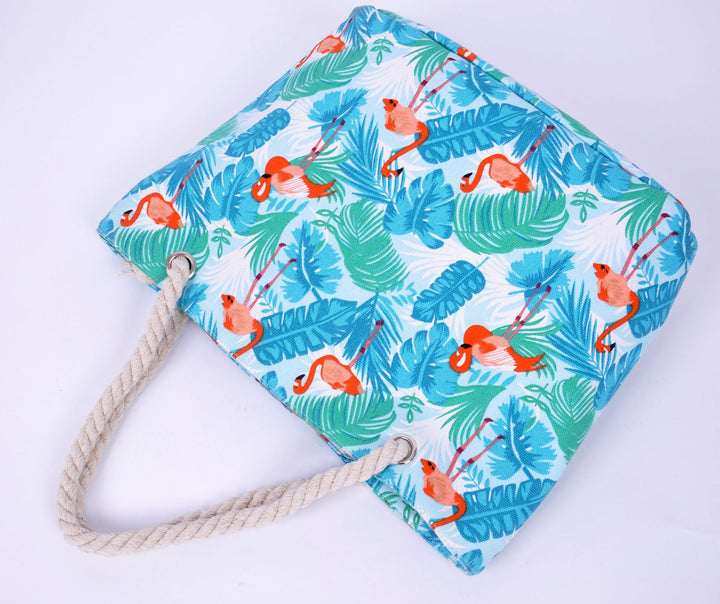 Large beach bag with vibrant flamingo motifs Bowlift