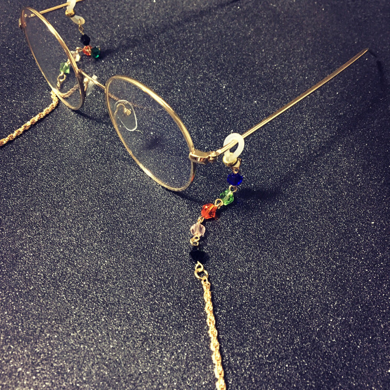 Filigree jewelry necklace with colorful crystals Bowlift