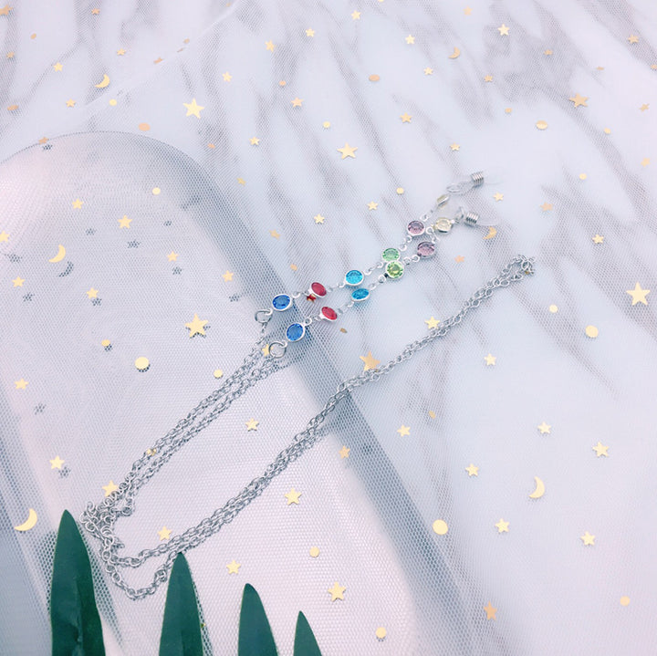 Filigree jewelry necklace with colorful crystals Bowlift