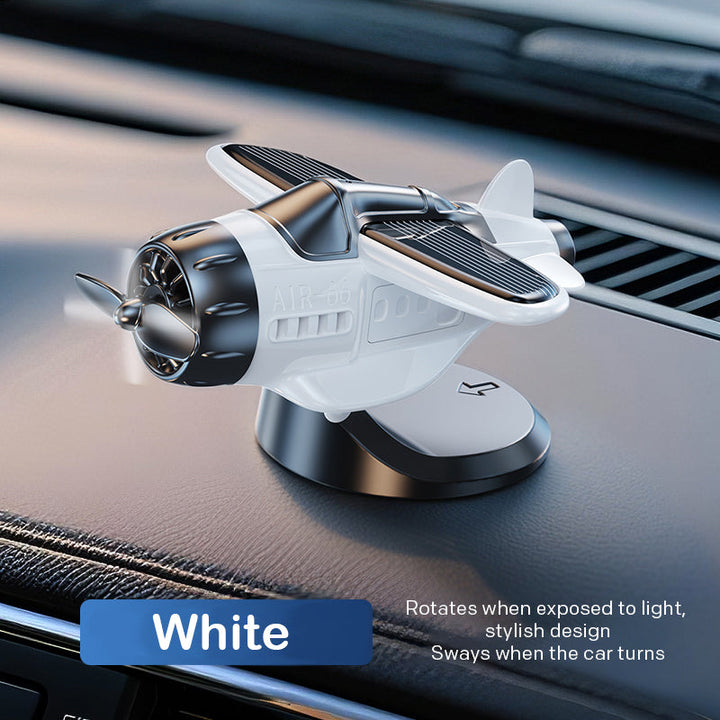 BowLift | Solar powered airplane shaped car ornaments