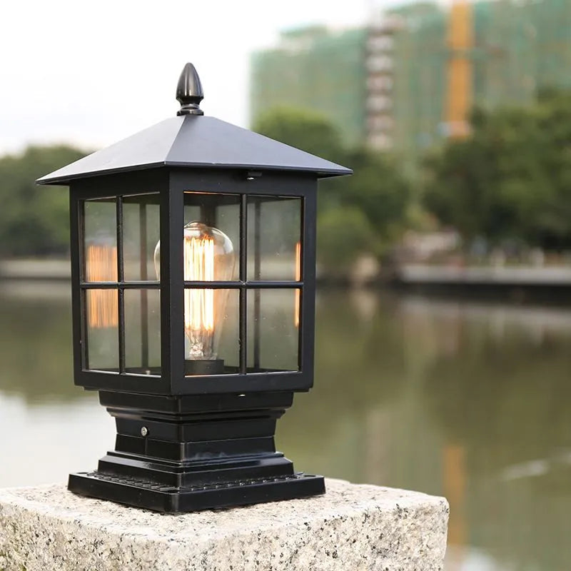Weatherproof outdoor lantern on column in black metal | Bowlift