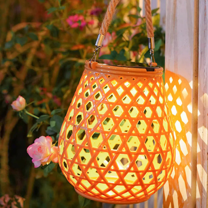 Traditional Chinese Solar Waterproof Oval Round Hollow Mesh ABS LED Outdoor Landscape Light For Garden | Bowlift