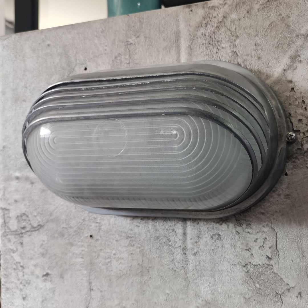 Contemporary Industrial Waterproof Aluminum Glass Frosted Oval Striped 1-Light Wall Sconce Lamp For Outdoor Patio | Bowlift