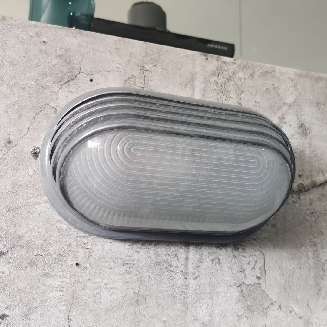 Contemporary Industrial Waterproof Aluminum Glass Frosted Oval Striped 1-Light Wall Sconce Lamp For Outdoor Patio | Bowlift
