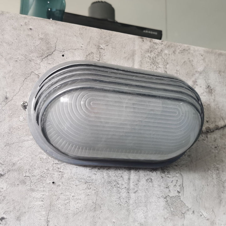 Contemporary Industrial Waterproof Aluminum Glass Frosted Oval Striped 1-Light Wall Sconce Lamp For Outdoor Patio | Bowlift