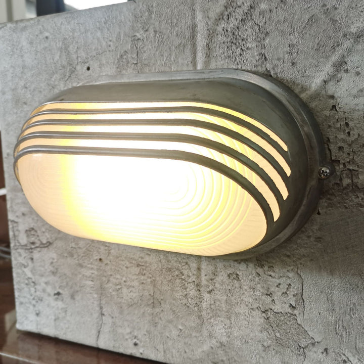 Contemporary Industrial Waterproof Aluminum Glass Frosted Oval Striped 1-Light Wall Sconce Lamp For Outdoor Patio | Bowlift
