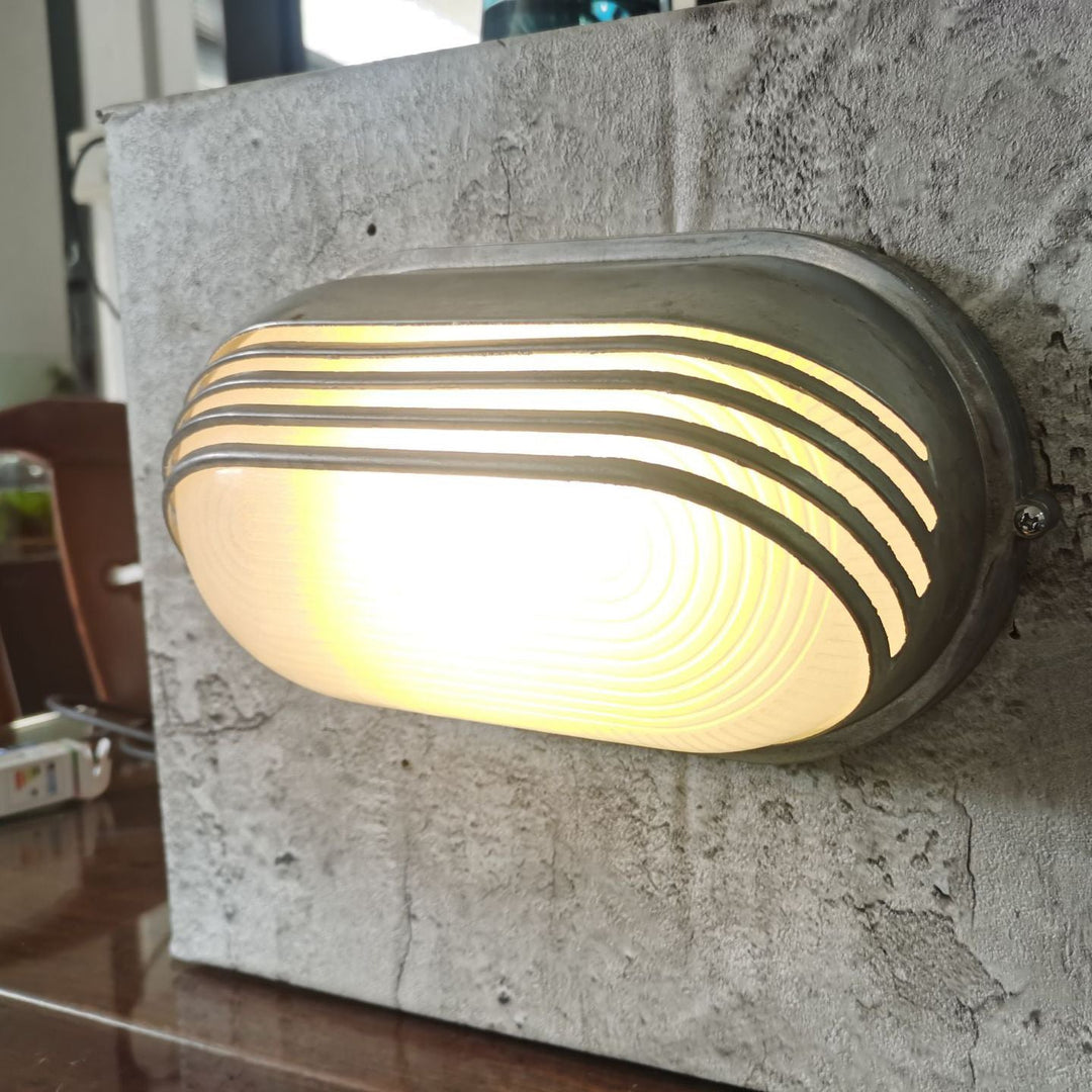 Contemporary Industrial Waterproof Aluminum Glass Frosted Oval Striped 1-Light Wall Sconce Lamp For Outdoor Patio | Bowlift
